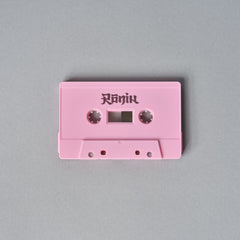 Pink audio cassette tape with ’Ranjit’ written on it.