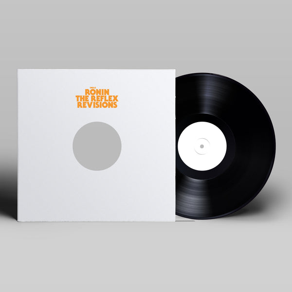 Vinyl record album with a white sleeve featuring orange text.