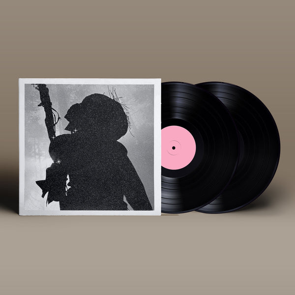 Vinyl record album with a black and white silhouette cover art.